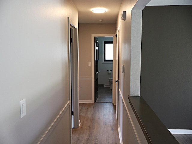 corridor with wood finished floors