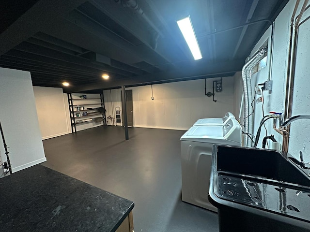 laundry area with washing machine and clothes dryer and laundry area