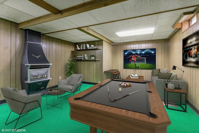 recreation room with wood walls, carpet, pool table, a paneled ceiling, and baseboards
