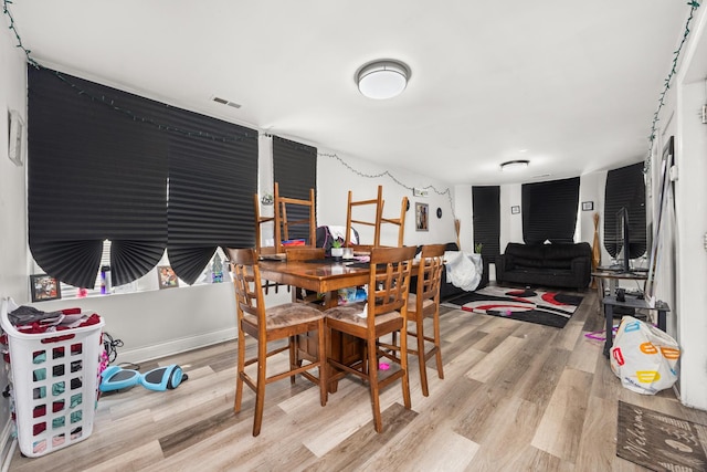 7123 S Green St, Chicago, IL 60621 - dining area featuring wood finished floors