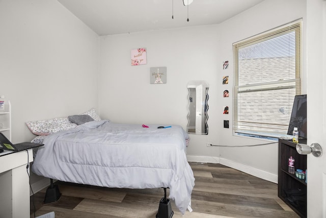 7123 S Green St, Chicago, IL 60621 - bedroom featuring wood finished floors, multiple windows, and baseboards