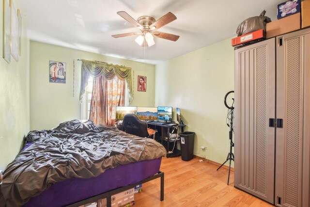 bedroom featuring ceiling fan and light wood finished floors