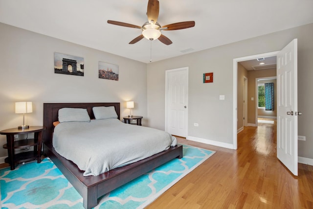 6029 N Ridge Ave, Chicago, IL 60660 - bedroom featuring light wood-style floors, baseboards, and ceiling fan