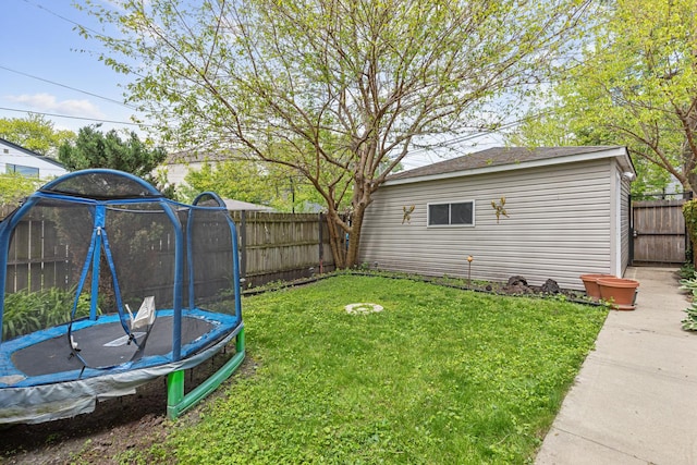 6029 N Ridge Ave, Chicago, IL 60660 - view of yard with a trampoline and an outdoor structure