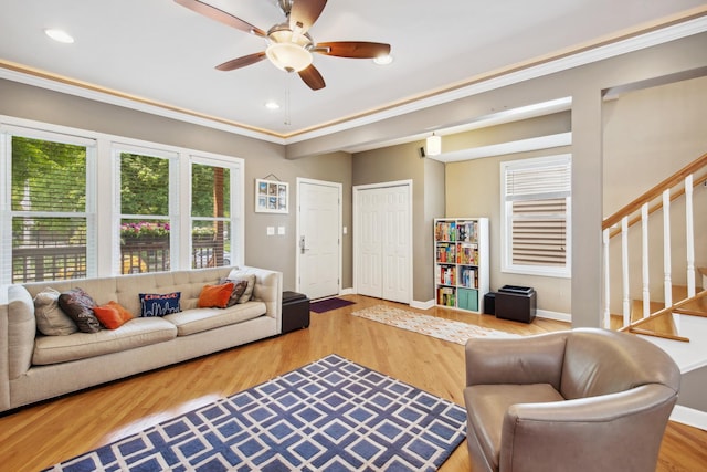 6029 N Ridge Ave, Chicago, IL 60660 - living area with stairway, a ceiling fan, wood finished floors, baseboards, and recessed lighting