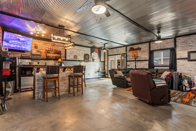 1003 Poplar St, Monticello, IL 61856 - interior space featuring concrete floors and a ceiling fan