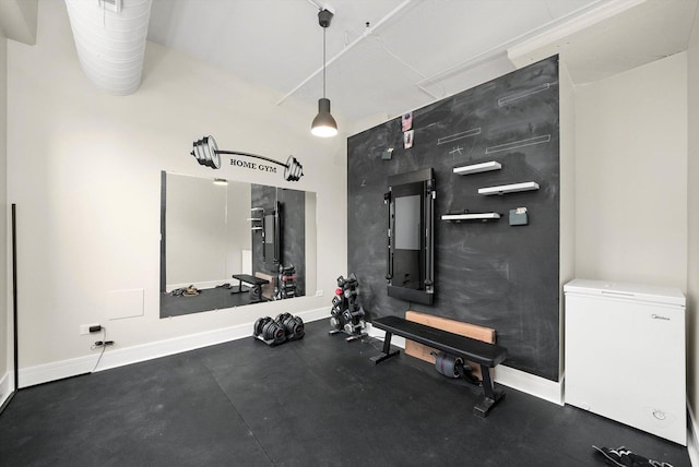 workout area with baseboards