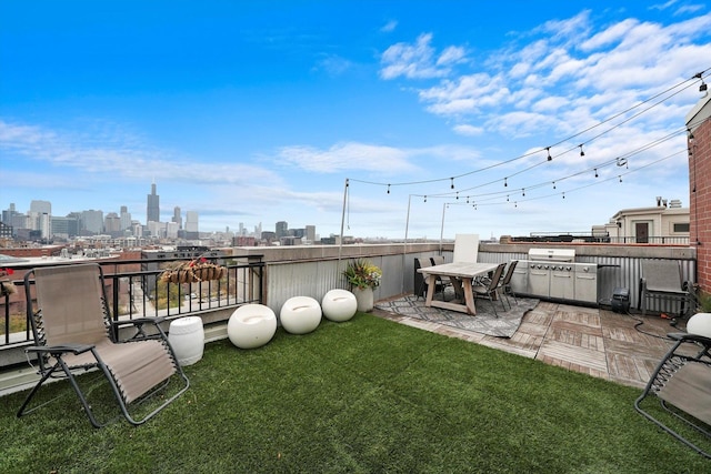 view of yard with a view of city