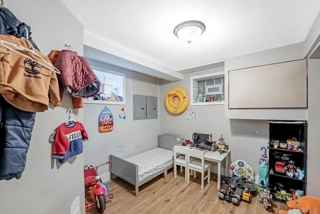 4158 W Nelson St, Chicago, IL 60641 - bedroom with electric panel and wood finished floors
