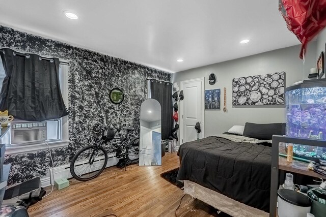 4158 W Nelson St, Chicago, IL 60641 - bedroom with cooling unit, wallpapered walls, wood finished floors, and recessed lighting