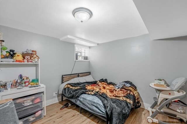 4158 W Nelson St, Chicago, IL 60641 - bedroom with baseboards and wood finished floors