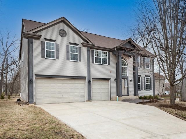 view of front of home featuring a garage and concrete driveway