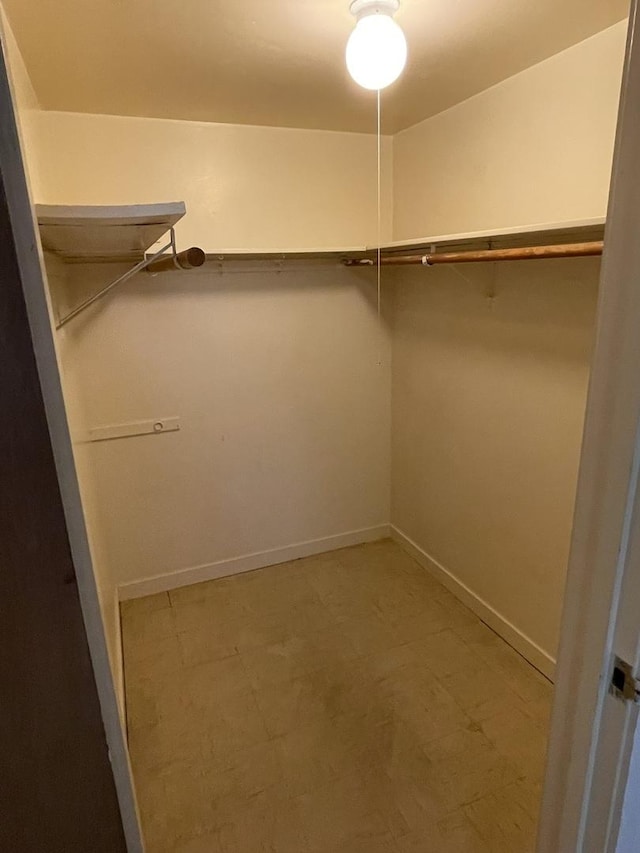 5517 S Dorchester Ave, Chicago, IL 60637 - walk in closet with tile patterned floors