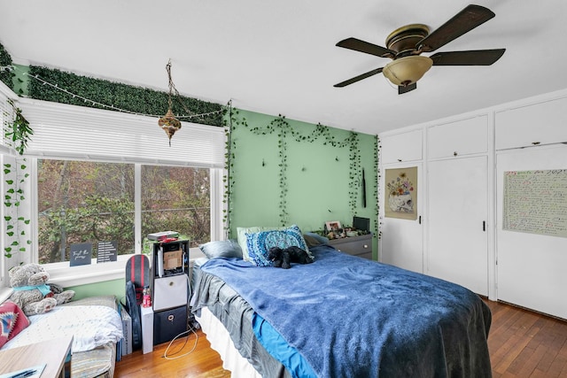 302 Flora Dr, Champaign, IL 61821 - bedroom featuring wood finished floors and a ceiling fan