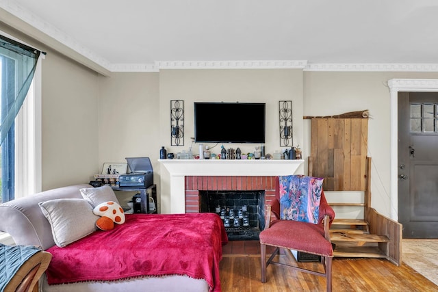 302 Flora Dr, Champaign, IL 61821 - living area featuring wood finished floors and a fireplace