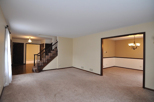 37 Pottowattomie Ct, Naperville, IL 60563 - carpeted empty room with stairs, baseboards, and a chandelier