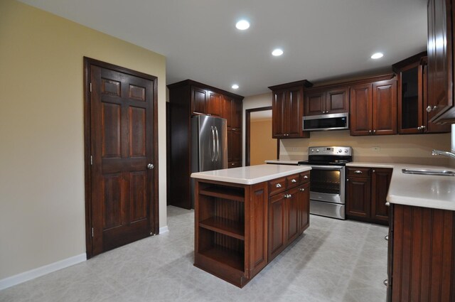 37 Pottowattomie Ct, Naperville, IL 60563 - kitchen with appliances with stainless steel finishes, a sink, light countertops, recessed lighting, and open shelves