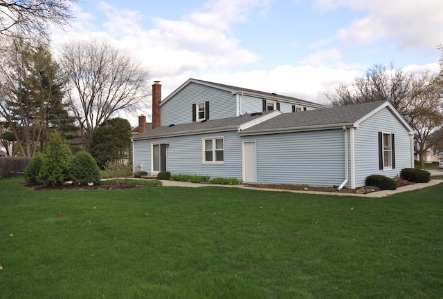 37 Pottowattomie Ct, Naperville, IL 60563 - rear view of property with a lawn and a chimney