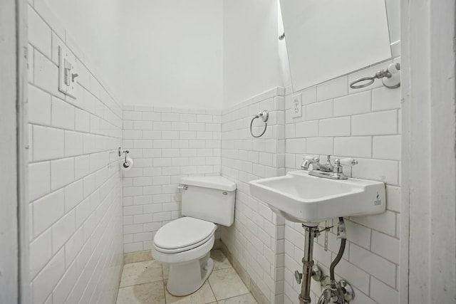3945 W Dakin St, Chicago, IL 60618 - half bath with tile walls, pet washing station, and tile patterned flooring