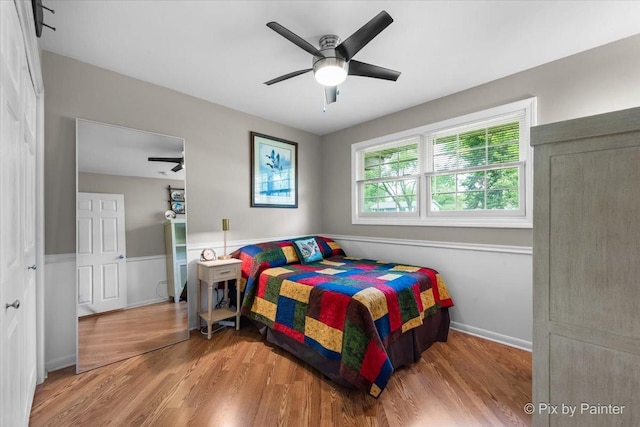 537 71st St, Darien, IL 60561 - bedroom with wood finished floors and ceiling fan