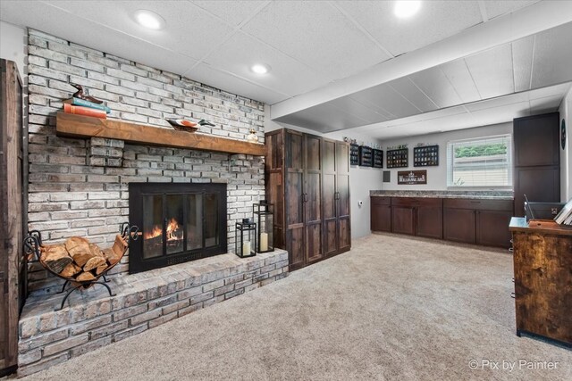537 71st St, Darien, IL 60561 - living room featuring carpet floors, a brick fireplace, and recessed lighting