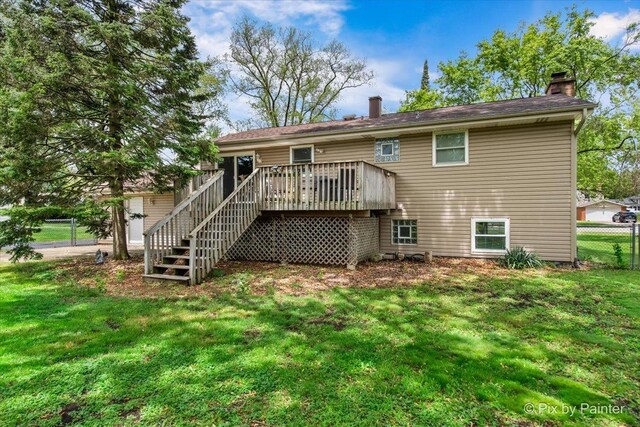 537 71st St, Darien, IL 60561 - rear view of house with a chimney, stairway, and a wooden deck