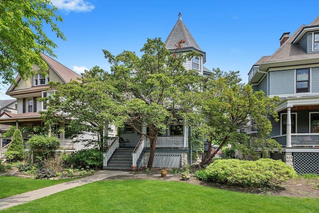 204 N Harvey Ave, Oak Park, IL 60302 - view of front of house with a front lawn, covered porch, and stairs