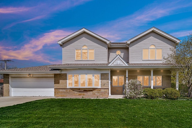 410 Dorothy Dr, Des Plaines, IL 60016 - view of front of house featuring a yard, a shingled roof, brick siding, and a garage
