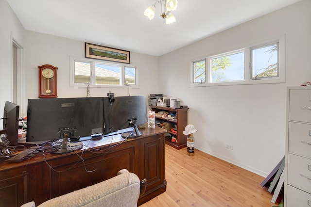 410 Dorothy Dr, Des Plaines, IL 60016 - home office featuring light wood finished floors, a chandelier, and baseboards