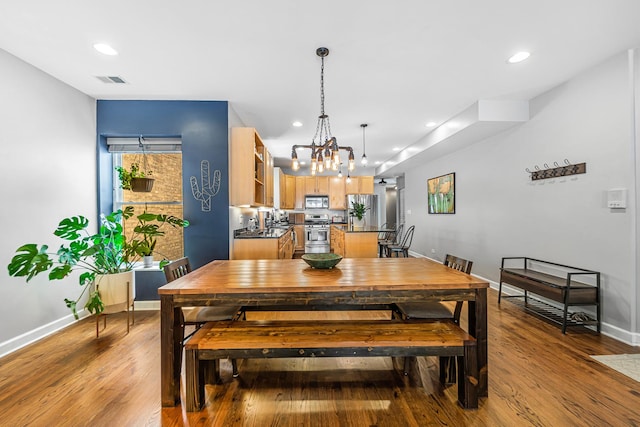 5016 N Sheridan Rd Unit 1, Chicago, IL 60640 - dining space featuring visible vents, wood finished floors, baseboards, and recessed lighting