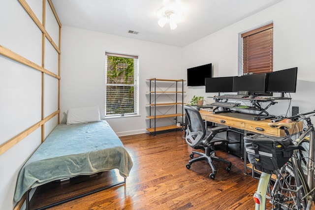 5016 N Sheridan Rd Unit 1, Chicago, IL 60640 - bedroom featuring visible vents, wood finished floors, and baseboards