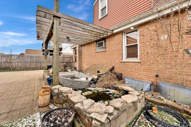 view of patio / terrace with fence