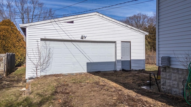 detached garage with fence