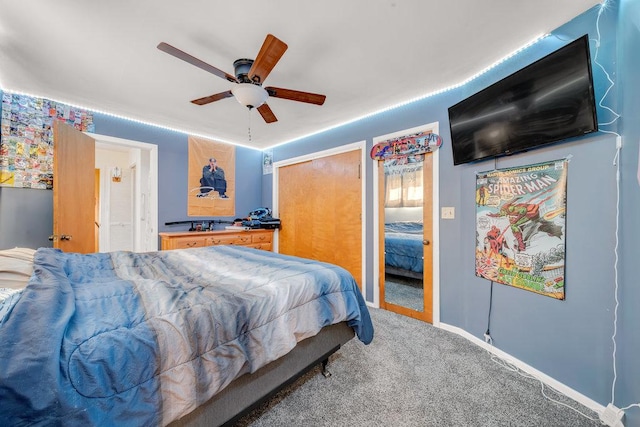 bedroom with ceiling fan and carpet
