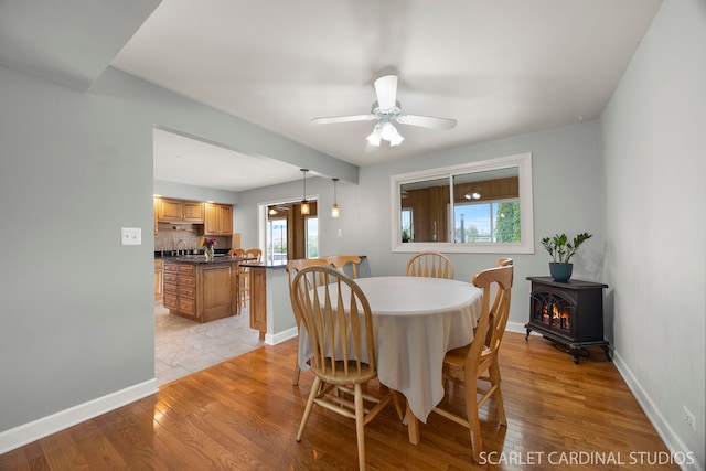 2288 Westminster St, Wheaton, IL 60189 - dining room featuring light wood-type flooring, baseboards, and ceiling fan