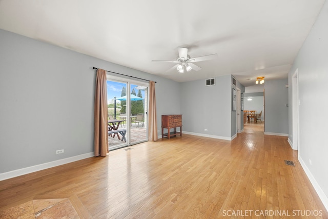 2288 Westminster St, Wheaton, IL 60189 - unfurnished living room featuring visible vents, light wood-style flooring, ceiling fan, and baseboards