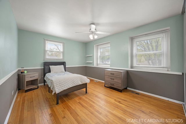 2288 Westminster St, Wheaton, IL 60189 - bedroom with ceiling fan, visible vents, baseboards, and hardwood / wood-style flooring