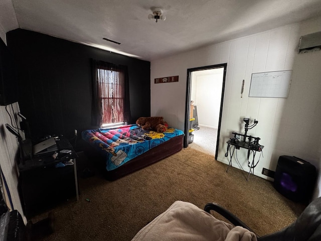 carpeted bedroom featuring visible vents