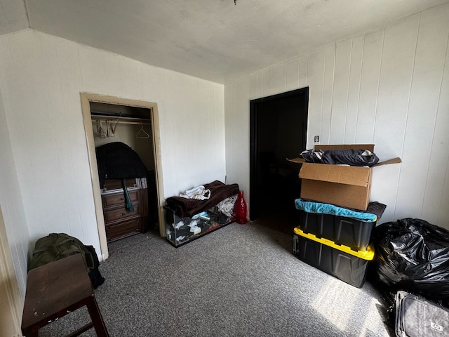 bedroom featuring vaulted ceiling and carpet floors