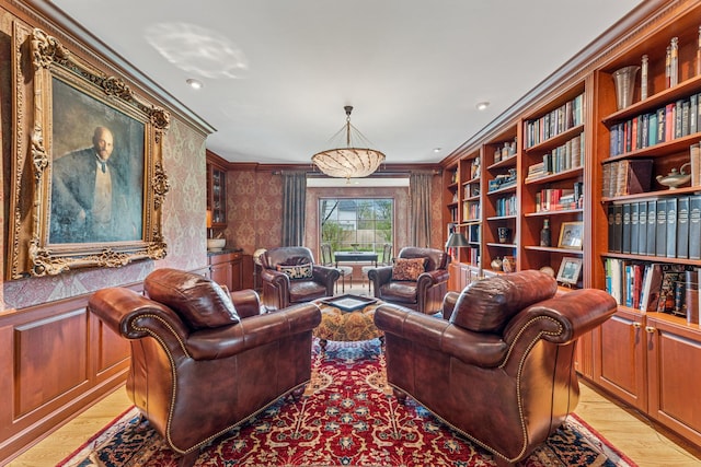 1135 Buttonwood Ln, Northbrook, IL 60062 - sitting room featuring ornamental molding, wallpapered walls, and light wood-style floors