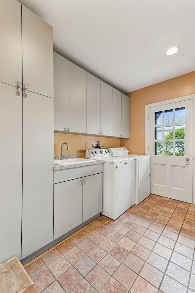 1135 Buttonwood Ln, Northbrook, IL 60062 - washroom featuring a sink, cabinet space, independent washer and dryer, recessed lighting, and stone finish flooring