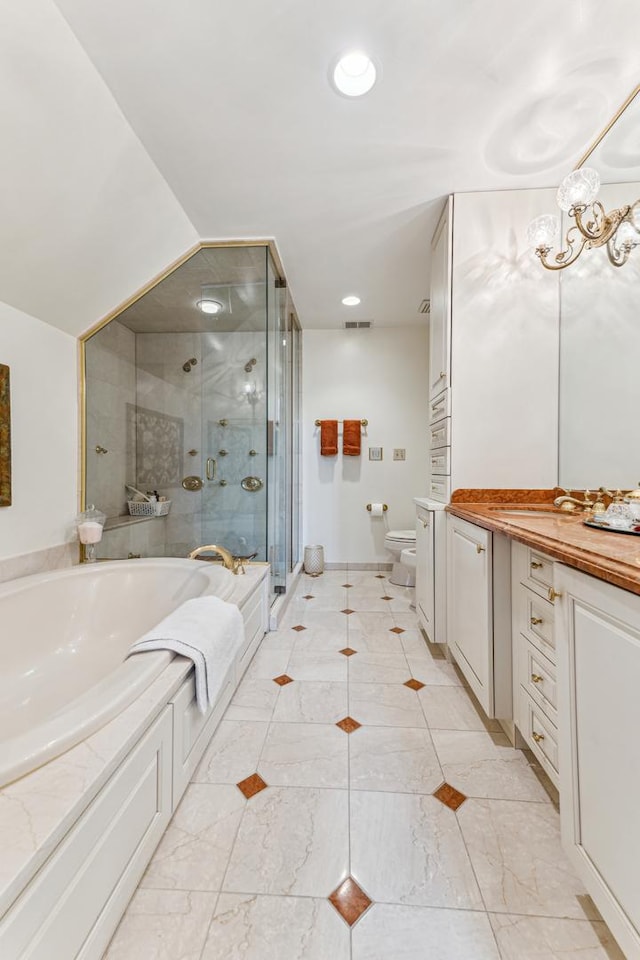 1135 Buttonwood Ln, Northbrook, IL 60062 - bathroom featuring a shower stall, a garden tub, vanity, toilet, and recessed lighting