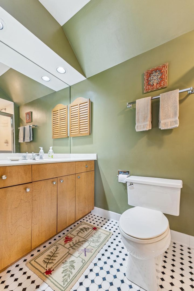 1135 Buttonwood Ln, Northbrook, IL 60062 - full bath featuring vaulted ceiling, vanity, toilet, and baseboards