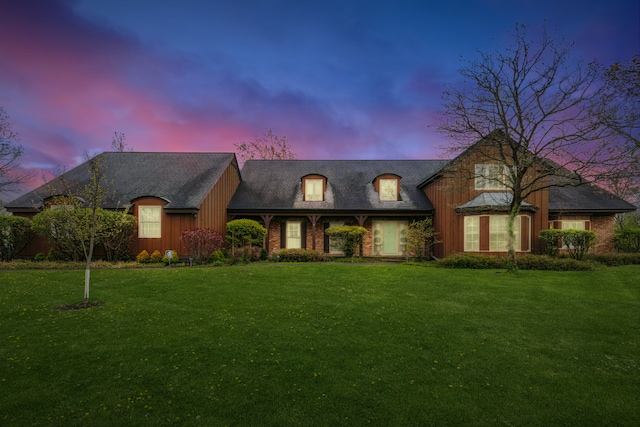 1135 Buttonwood Ln, Northbrook, IL 60062 - french country style house featuring a front lawn