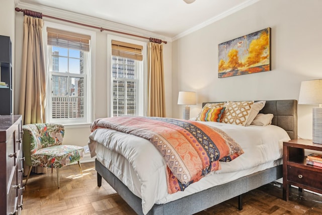 bedroom with baseboards and ornamental molding