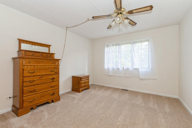 7834 W Foresthill Ct Unit 1Cr, Palos Heights, IL 60463 - bedroom with light colored carpet, baseboards, and a ceiling fan