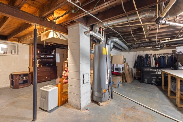 135 N Calhoun St, Aurora, IL 60505 - unfinished basement with water heater and concrete block wall
