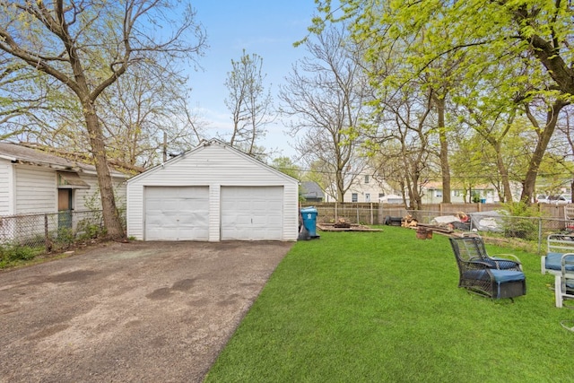 135 N Calhoun St, Aurora, IL 60505 - view of yard with an outbuilding and a detached garage