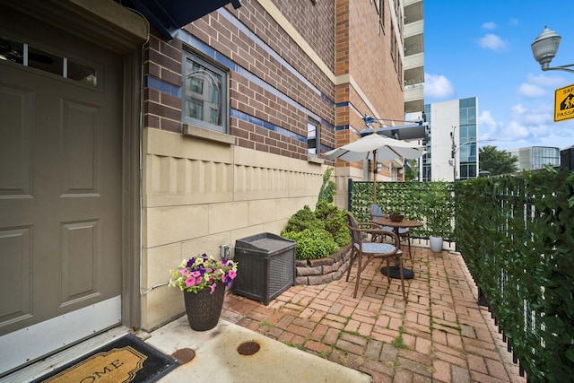 view of patio featuring outdoor dining space