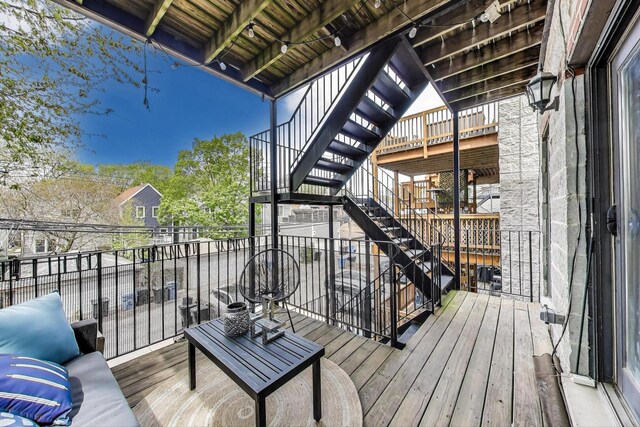 deck featuring stairway